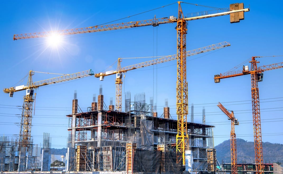 Building construction site with cranes